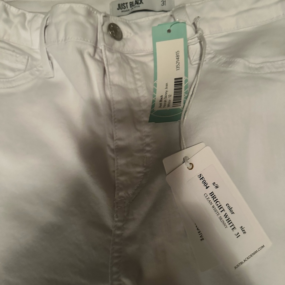 Brand new white jeans size 12
